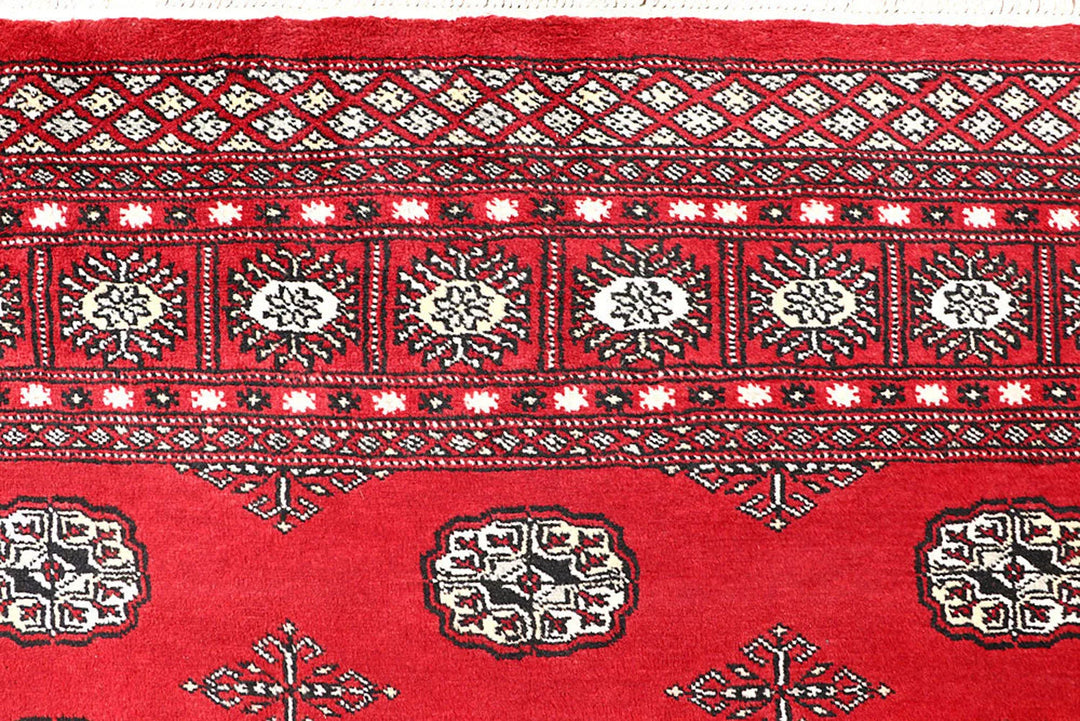 Red Pakistani Bokhara Rug 5' 9" x 8' 2" Hand-Knotted | No. QA53424