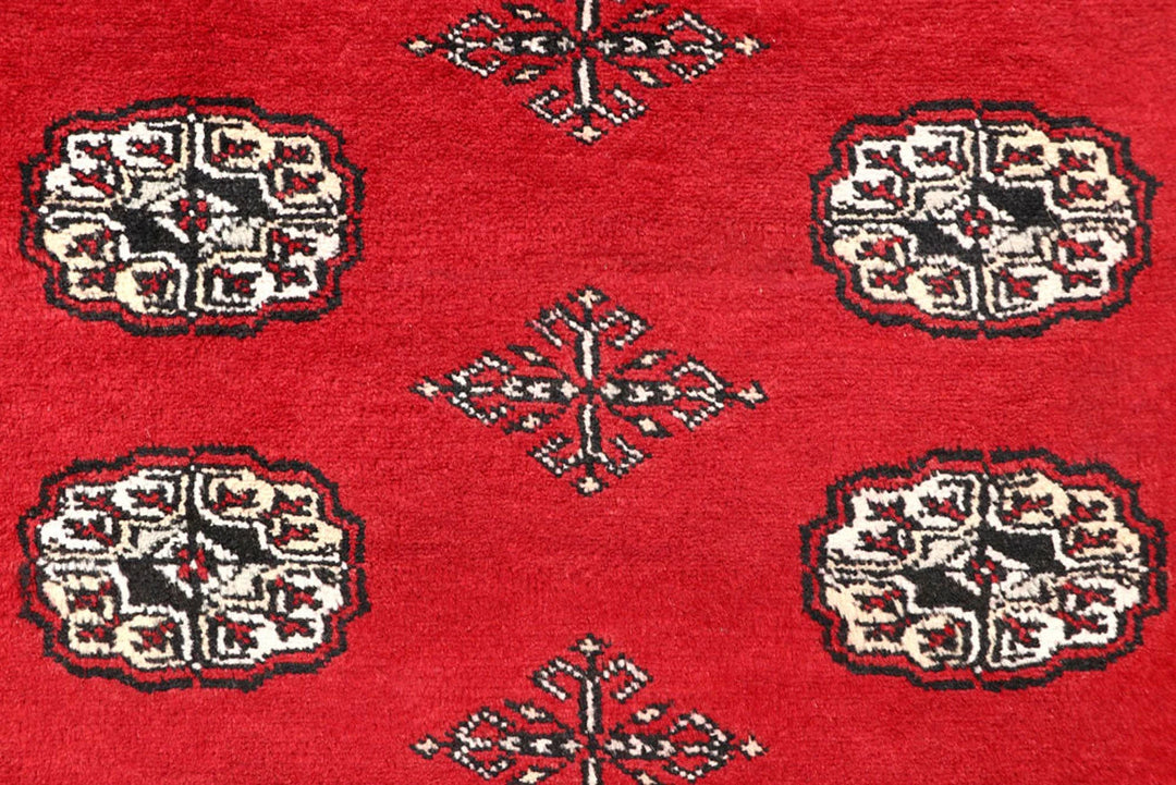 Red Pakistani Bokhara Rug 5' 9" x 8' 2" Hand-Knotted | No. QA53424