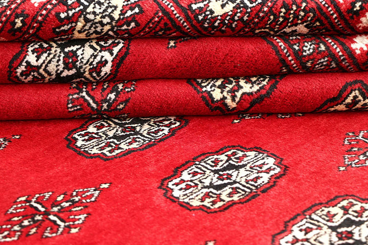 Red Pakistani Bokhara Rug 5' 9" x 8' 2" Hand-Knotted | No. QA53424