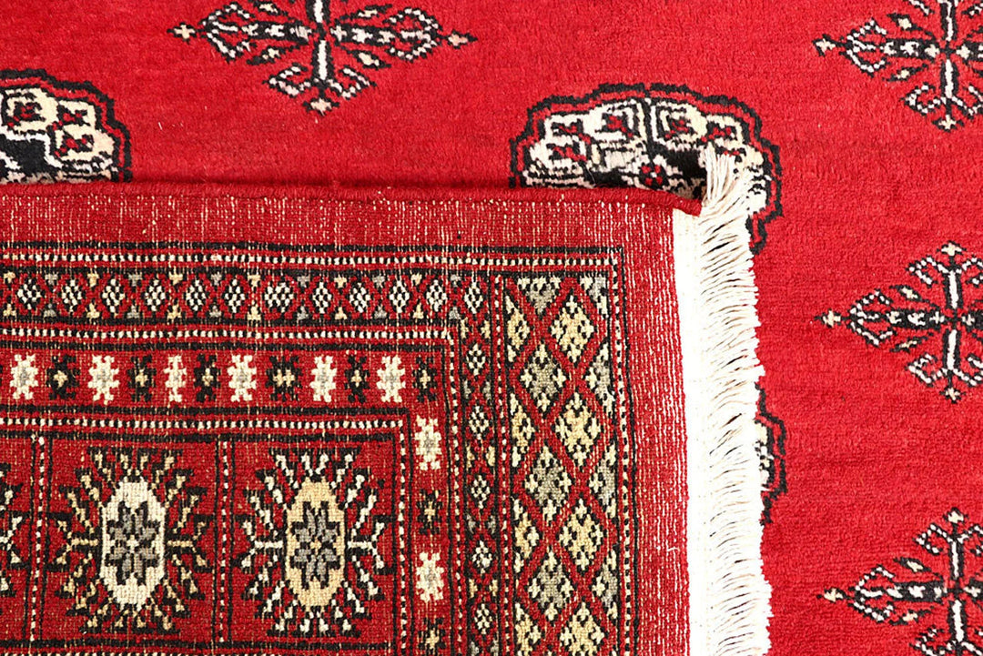 Red Pakistani Bokhara Rug 5' 9" x 8' 2" Hand-Knotted | No. QA53424