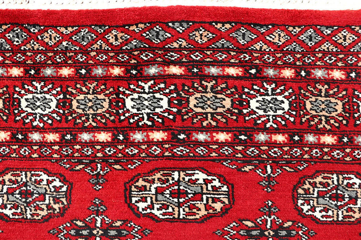 Red Pakistani Bokhara Rug 4' 4" x 6' 6" Hand-Knotted | No. QA53781