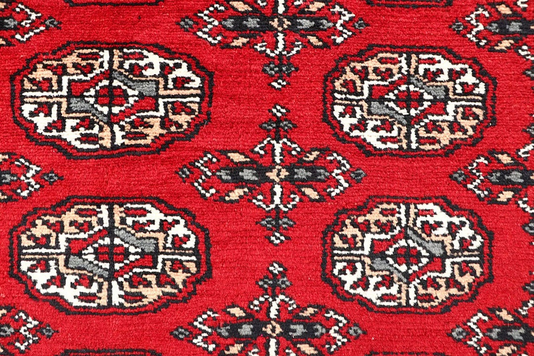 Red Pakistani Bokhara Rug 4' 4" x 6' 6" Hand-Knotted | No. QA53781