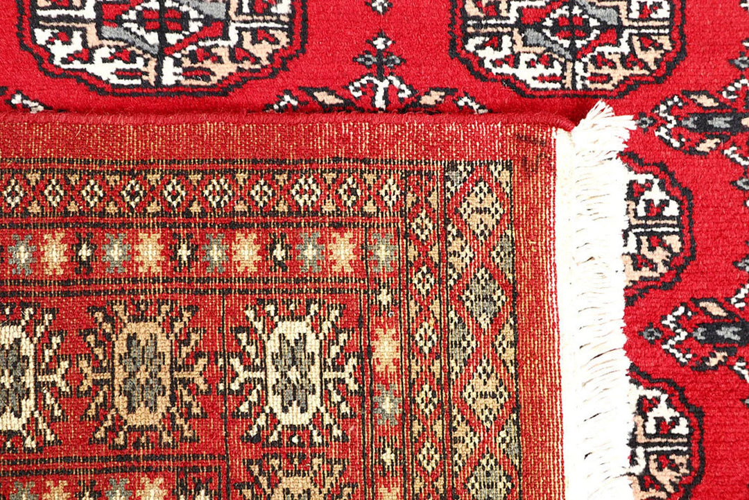 Red Pakistani Bokhara Rug 4' 4" x 6' 6" Hand-Knotted | No. QA53781