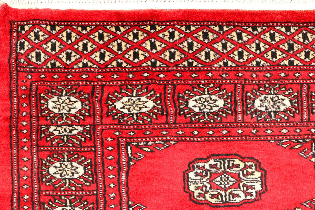 Red Pakistani Bokhara Rug 2' 6" x 9' 1" Hand-Knotted | No. QA54159