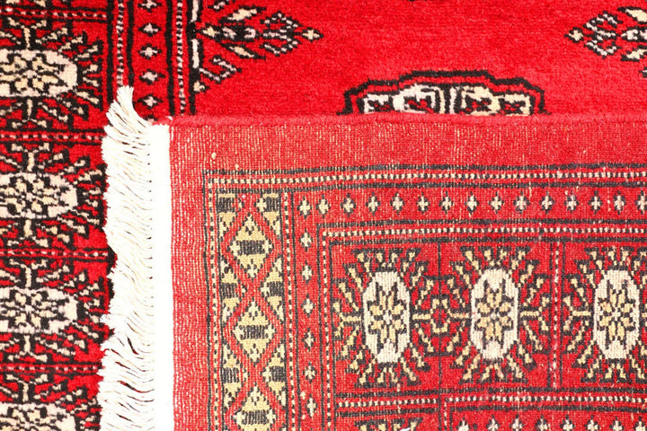 Red Pakistani Bokhara Rug 2' 6" x 9' 1" Hand-Knotted | No. QA54159