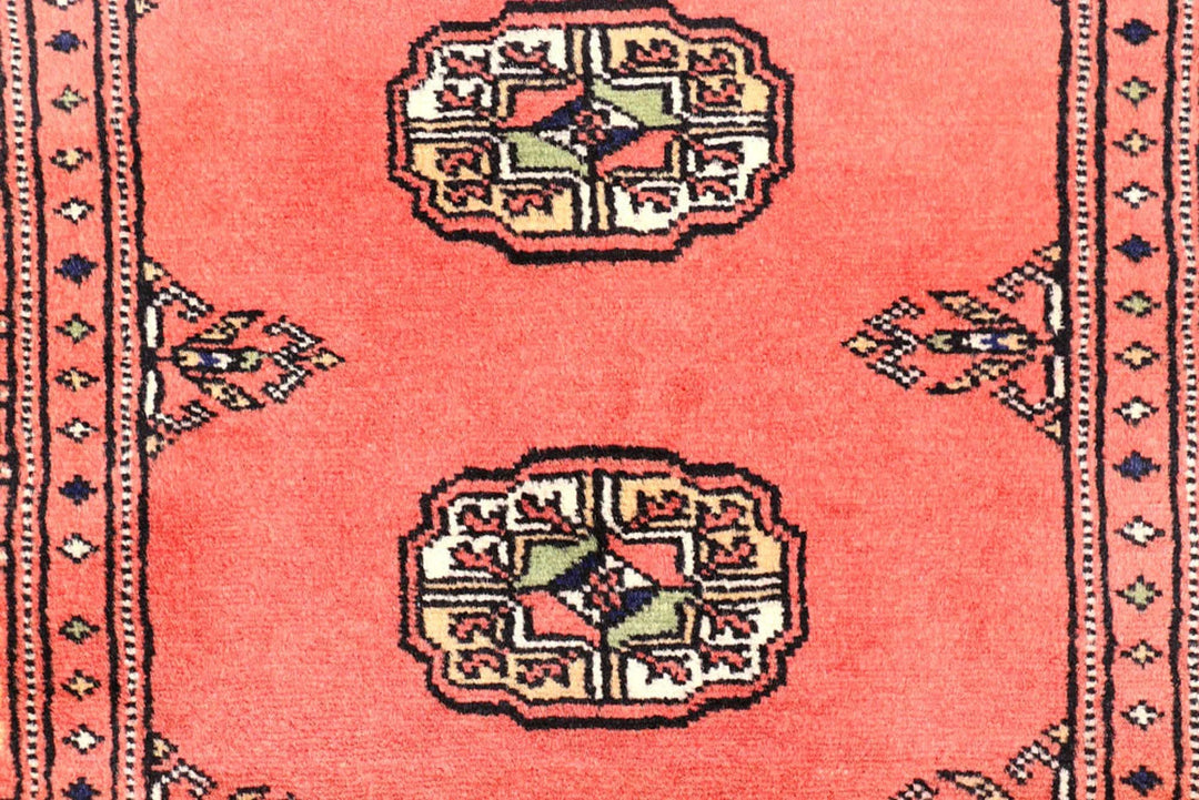 Salmon Pakistani Bokhara Rug 2' 7" x 9' 11" Hand-Knotted | No. QA54221