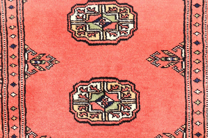Salmon Pakistani Bokhara Rug 2' 7" x 9' 11" Hand-Knotted | No. QA54221