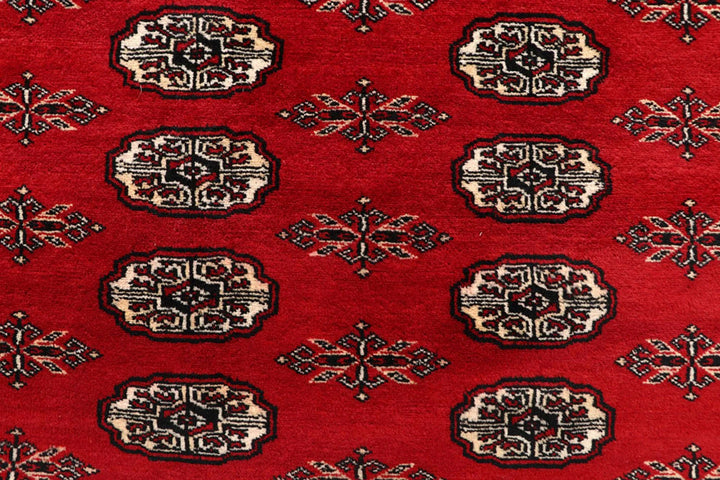 Firebrick Pakistani Bokhara Rug 8' 1" x 10' 3" Hand-Knotted | No. QA54582