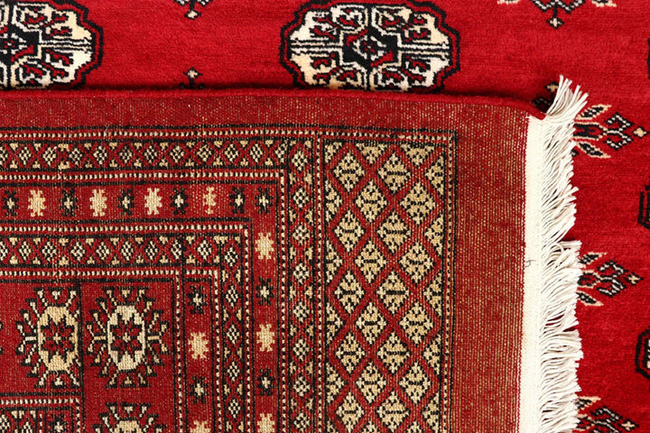 Firebrick Pakistani Bokhara Rug 8' 1" x 10' 3" Hand-Knotted | No. QA54582
