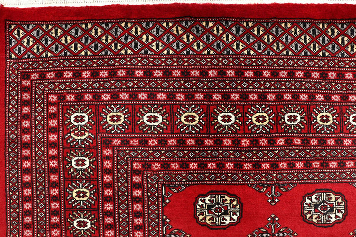 Red Pakistani Bokhara Rug 8' 1" x 10' 6" Hand-Knotted | No. QA54953