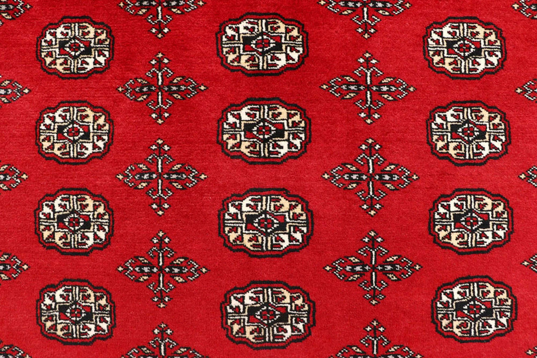 Red Pakistani Bokhara Rug 8' 1" x 10' 6" Hand-Knotted | No. QA54953