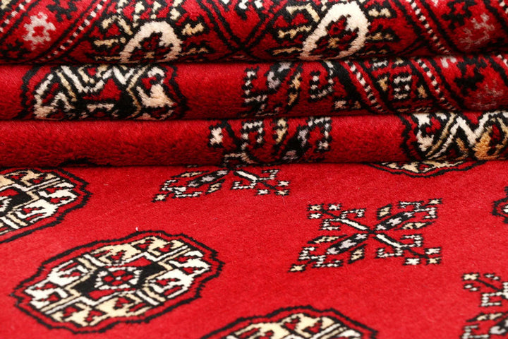 Red Pakistani Bokhara Rug 8' 1" x 10' 6" Hand-Knotted | No. QA54953