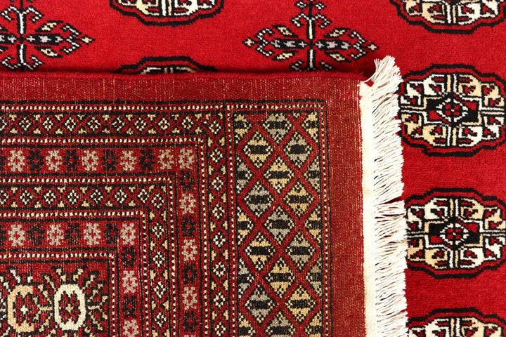 Red Pakistani Bokhara Rug 8' 1" x 10' 6" Hand-Knotted | No. QA54953