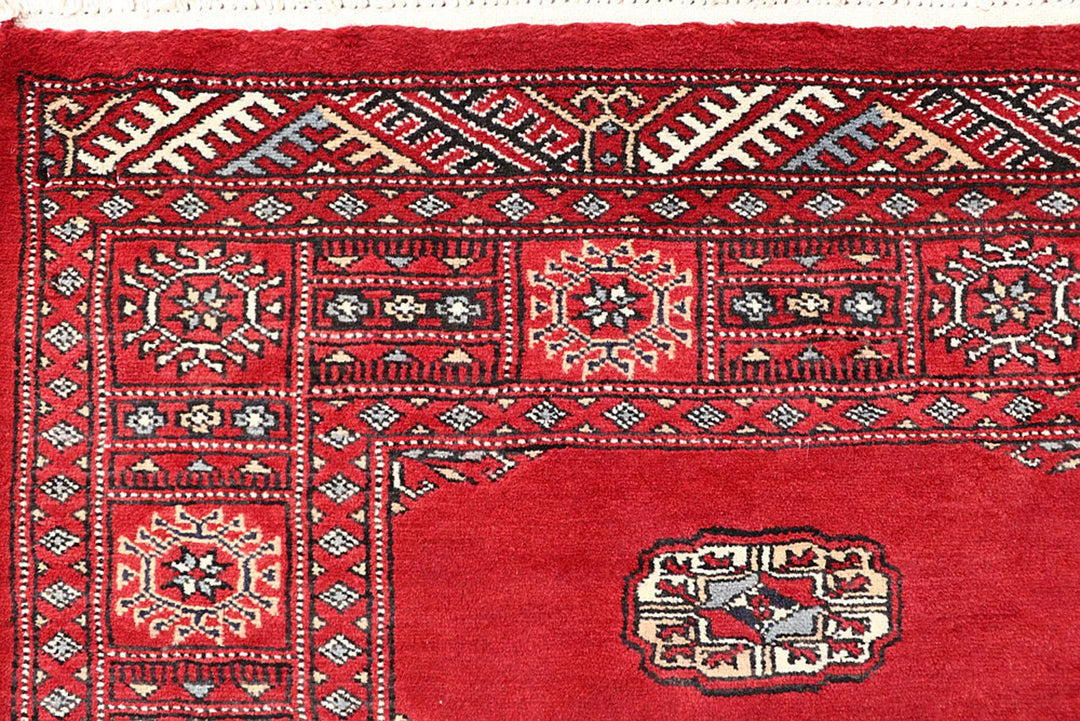 Red Pakistani Bokhara Rug 4' 1" x 6' Hand-Knotted | No. QA54978