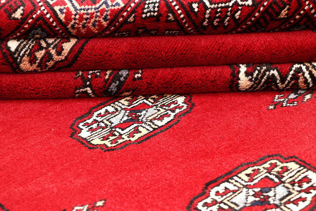Red Pakistani Bokhara Rug 4' 1" x 6' Hand-Knotted | No. QA54978