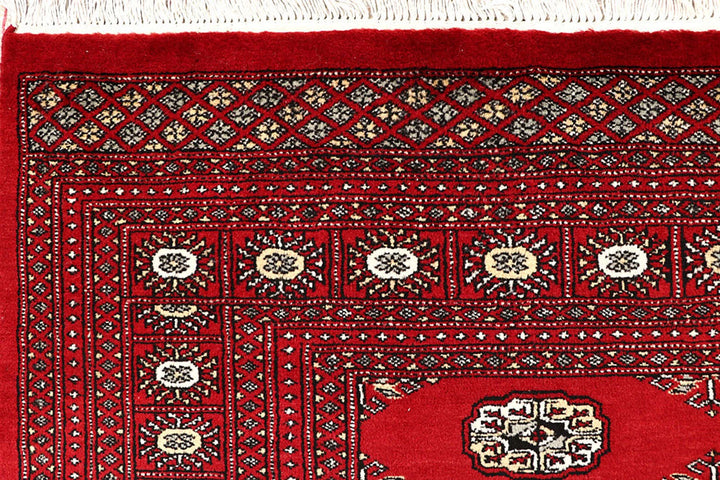 Red Pakistani Bokhara Rug 6' 2" x 8' 6" Hand-Knotted | No. QA55142