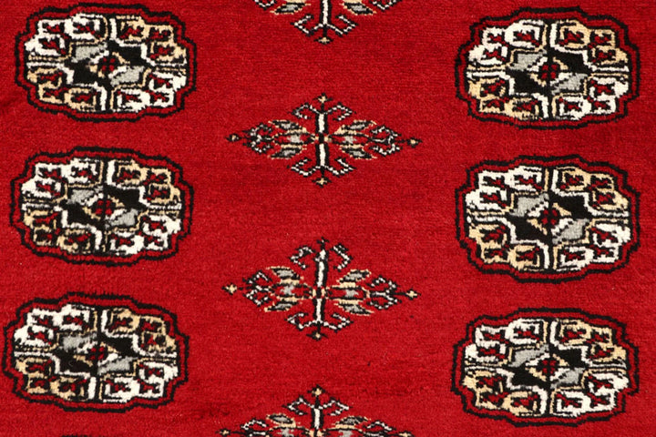 Red Pakistani Bokhara Rug 6' 2" x 8' 6" Hand-Knotted | No. QA55142