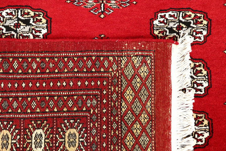 Red Pakistani Bokhara Rug 6' 2" x 8' 6" Hand-Knotted | No. QA55142