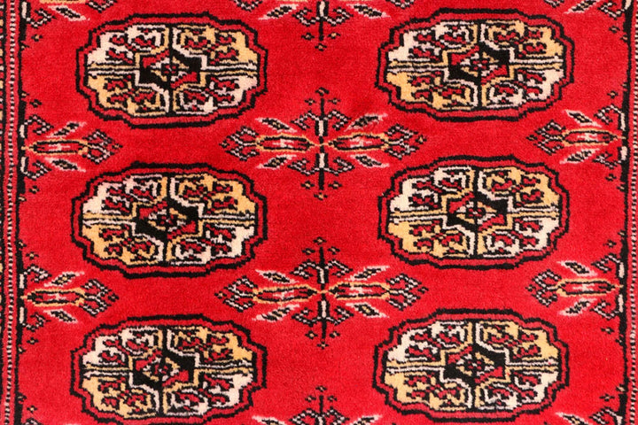 Red Pakistani Bokhara Rug 2' 6" x 10' 4" Hand-Knotted | No. QA55234