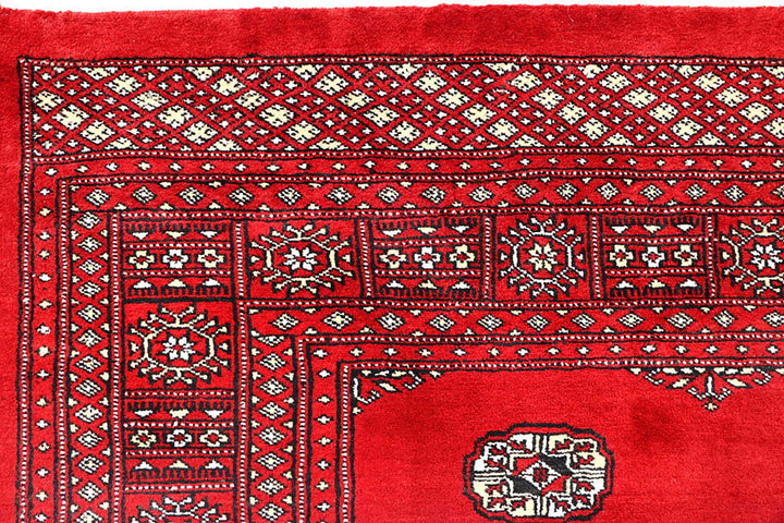 Red Pakistani Bokhara Rug 6' 2" x 9' 8" Hand-Knotted | No. QA55625