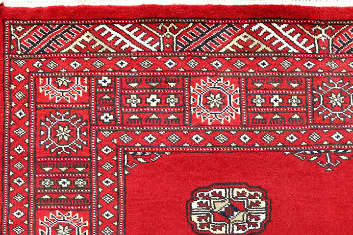 Red Pakistani Bokhara Rug 4' 1" x 6' 3" Hand-Knotted | No. QA55639