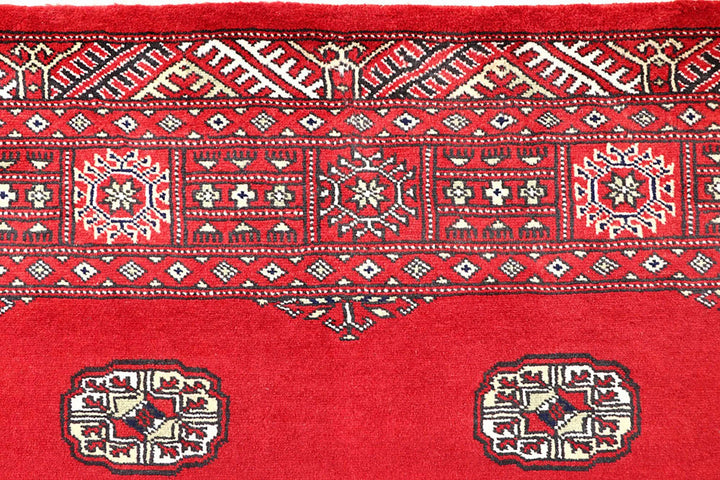 Red Pakistani Bokhara Rug 4' 1" x 6' 3" Hand-Knotted | No. QA55639
