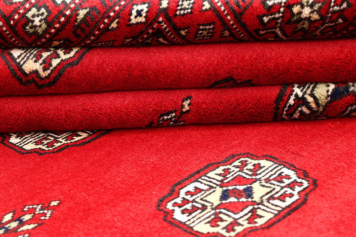 Red Pakistani Bokhara Rug 4' 1" x 6' 3" Hand-Knotted | No. QA55639