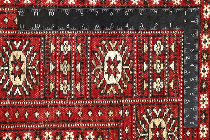 Firebrick Pakistani Bokhara Rug 4' 11" x 7' 9" Hand-Knotted | No. QA55857