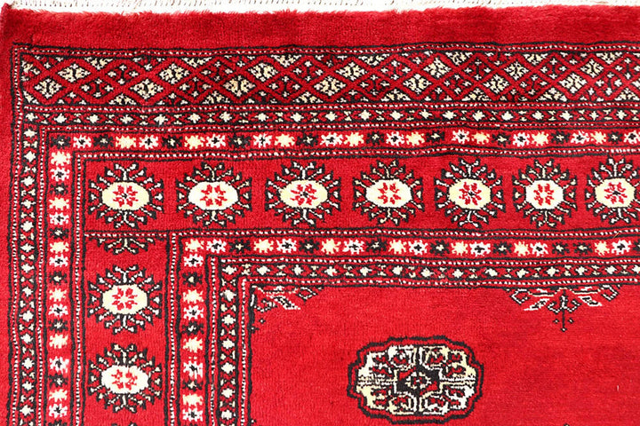 Red Pakistani Bokhara Rug 5' 7" x 8' 10" Hand-Knotted | No. QA56012