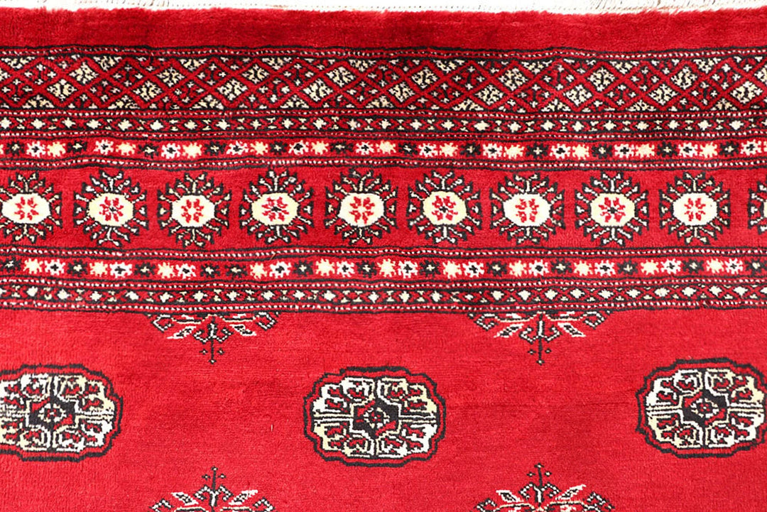 Red Pakistani Bokhara Rug 5' 7" x 8' 10" Hand-Knotted | No. QA56012