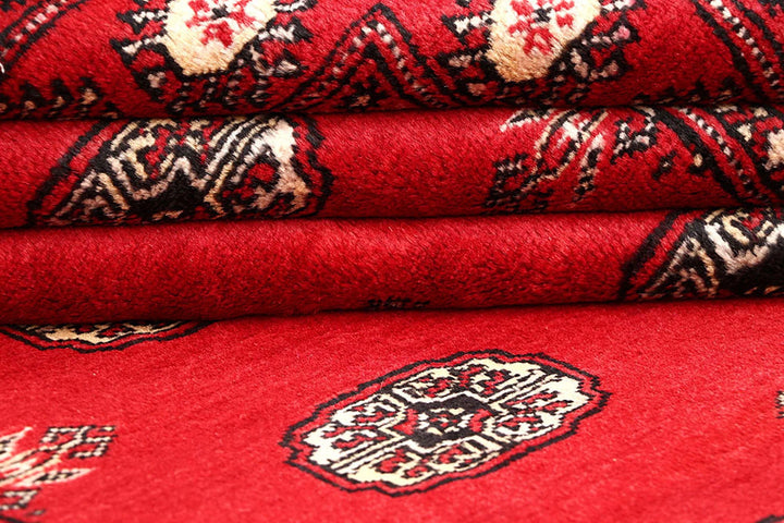 Red Pakistani Bokhara Rug 5' 7" x 8' 10" Hand-Knotted | No. QA56012