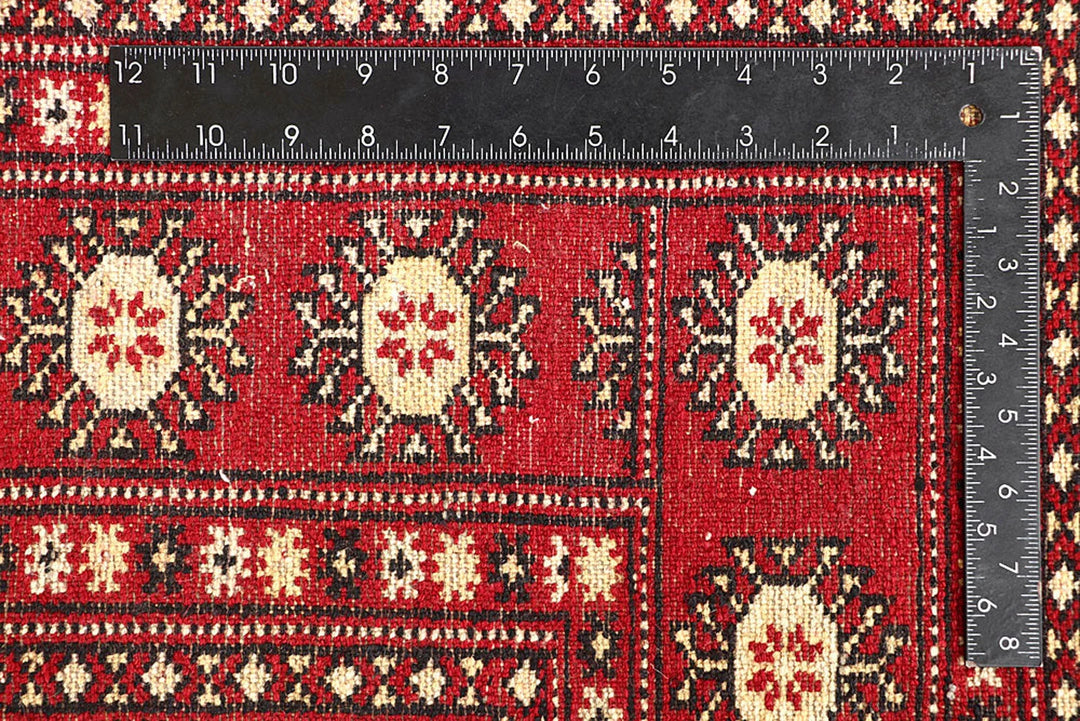 Red Pakistani Bokhara Rug 5' 7" x 8' 10" Hand-Knotted | No. QA56012