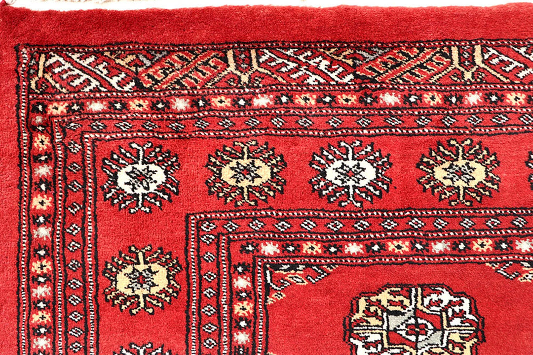 Firebrick Red Pakistani Bokhara Rug 5' 4" x 8' 5" Hand-Knotted | No. QA56210