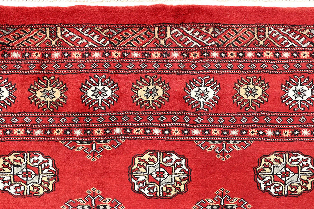 Firebrick Red Pakistani Bokhara Rug 5' 4" x 8' 5" Hand-Knotted | No. QA56210