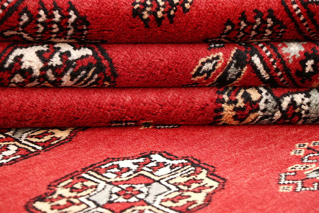 Firebrick Red Pakistani Bokhara Rug 5' 4" x 8' 5" Hand-Knotted | No. QA56210