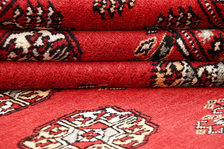 Firebrick Red Pakistani Bokhara Rug 5' 4" x 8' 5" Hand-Knotted | No. QA56210