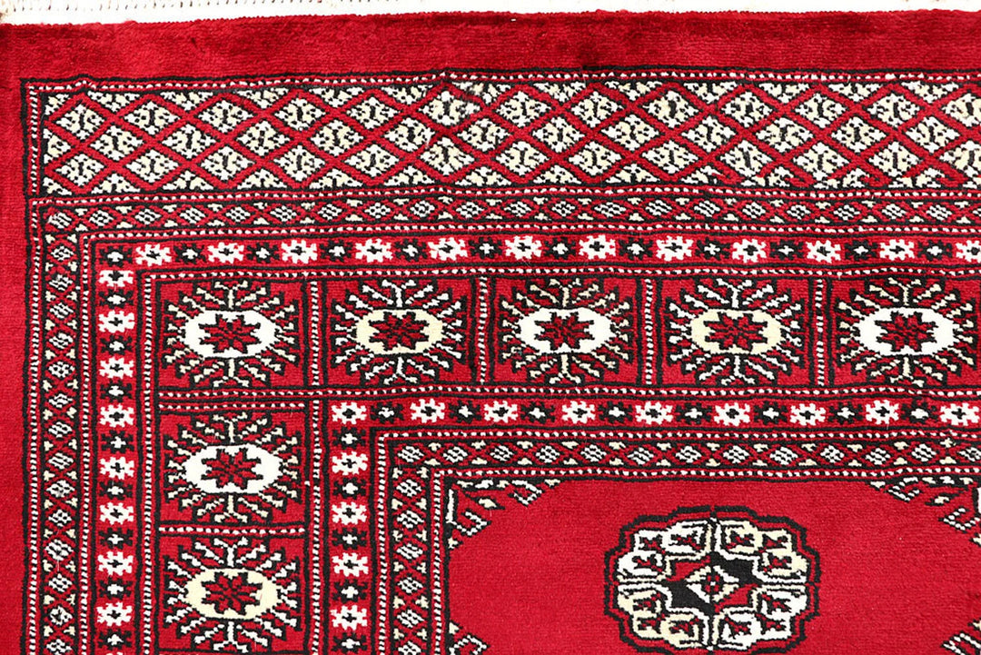 Red Pakistani Bokhara Rug 4' 5" x 6' 3" Hand-Knotted | No. QA56380