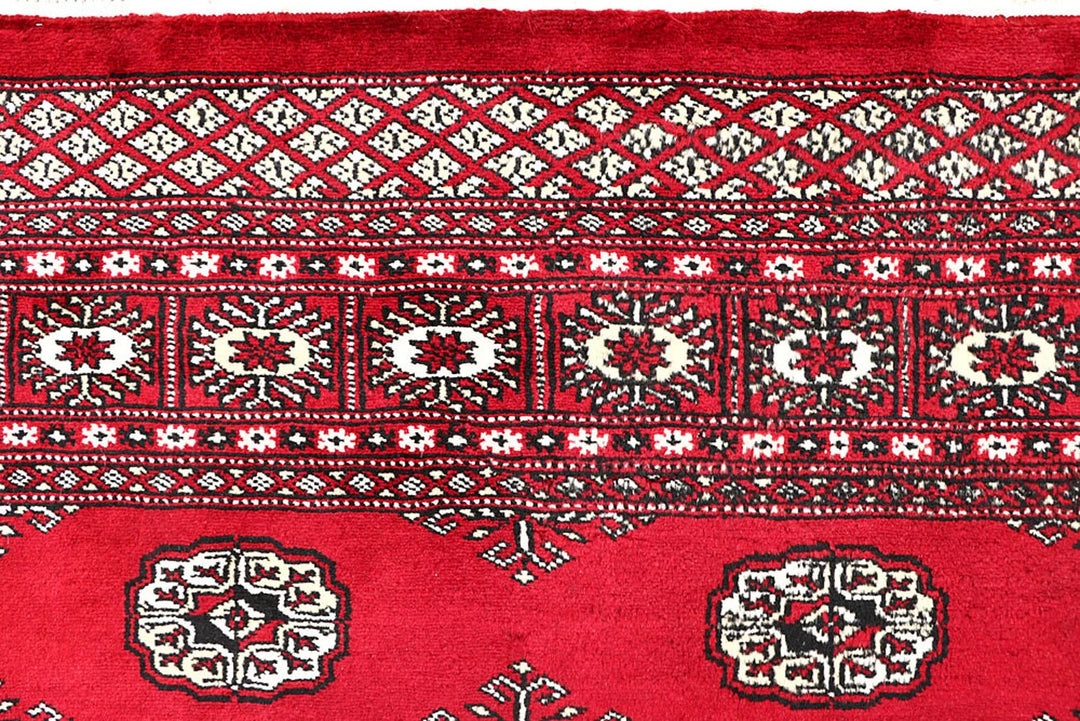 Red Pakistani Bokhara Rug 4' 5" x 6' 3" Hand-Knotted | No. QA56380