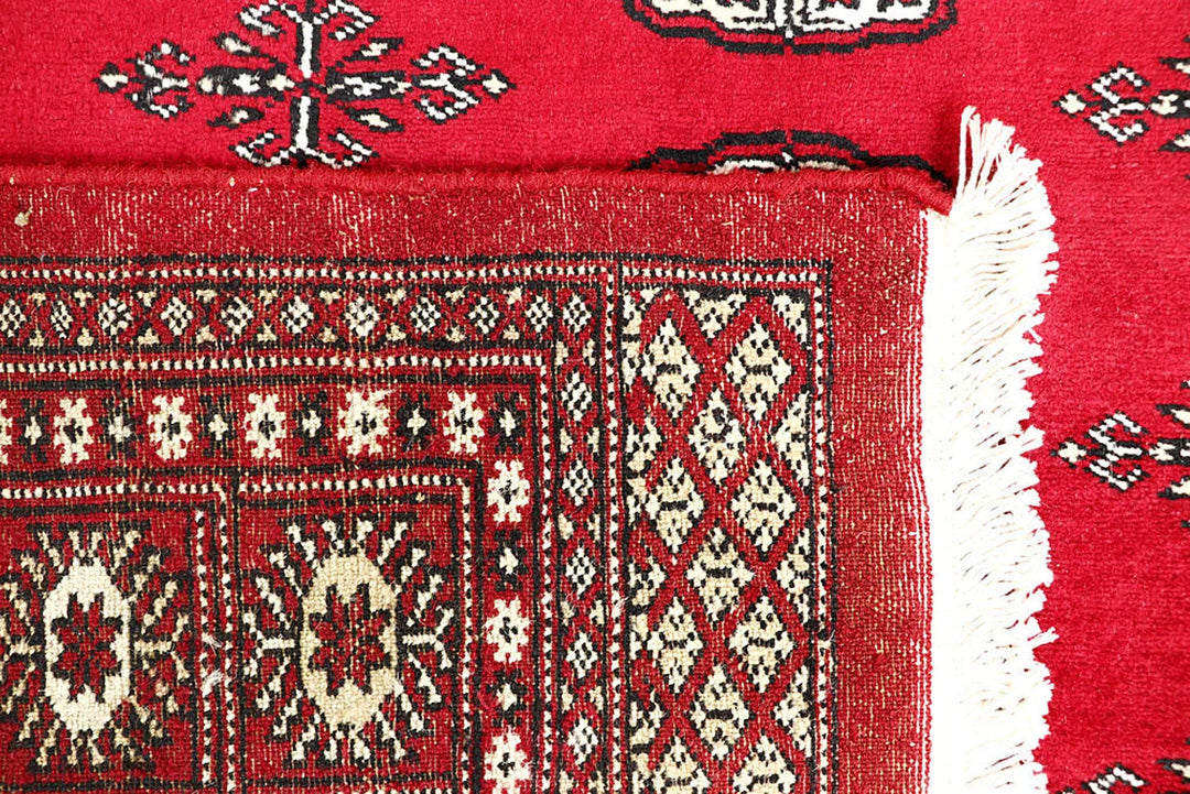 Red Pakistani Bokhara Rug 4' 5" x 6' 3" Hand-Knotted | No. QA56380