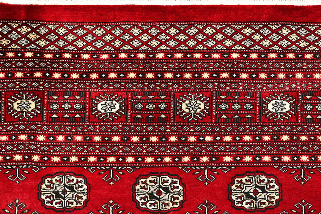 Red Pakistani Bokhara Rug 9' x 11' 11" Hand-Knotted | No. QA56622