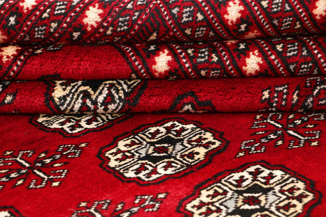 Red Pakistani Bokhara Rug 9' x 11' 11" Hand-Knotted | No. QA56622