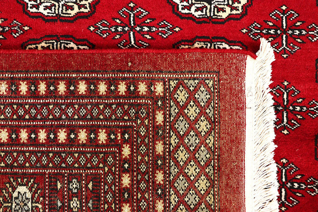 Red Pakistani Bokhara Rug 9' x 11' 11" Hand-Knotted | No. QA56622