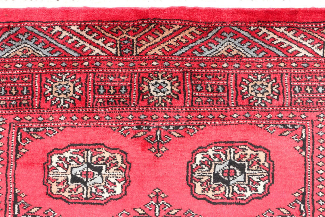 Red Pakistani Bokhara Rug 3' 2" x 4' 11" Hand-Knotted | No. QA56717