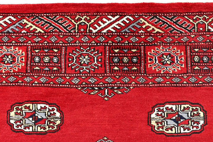Red Pakistani Bokhara Rug 4' x 6'1" Hand-Knotted | No. QA57233