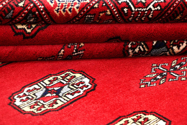 Red Pakistani Bokhara Rug 4' x 6'1" Hand-Knotted | No. QA57233