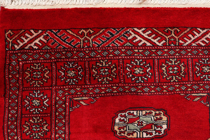 Red Pakistani Bokhara Rug 2' 6" x 9' 8" Hand-Knotted | No. QA57770