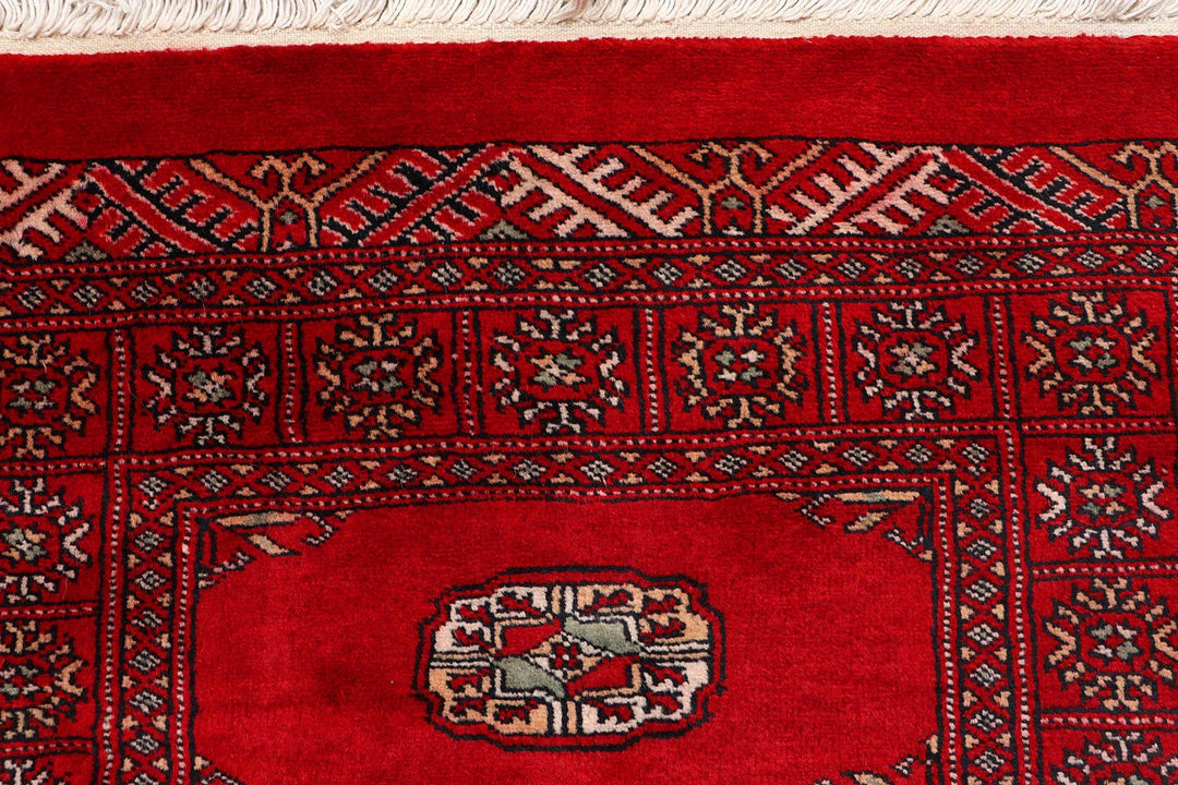 Red Pakistani Bokhara Rug 2' 6" x 9' 8" Hand-Knotted | No. QA57770