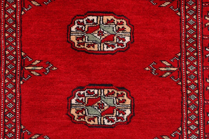 Red Pakistani Bokhara Rug 2' 6" x 9' 8" Hand-Knotted | No. QA57770