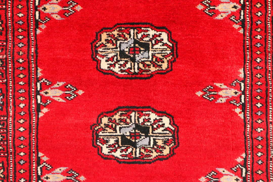 Red Pakistani Bokhara Rug 2' 6" x 8' 9" Hand-Knotted | No. QA57822
