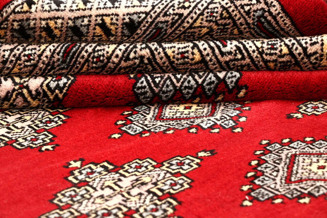 Firebrick Red Pakistani Bokhara Rug 10' 1" x 14' 1" Hand-Knotted | No. QA57870